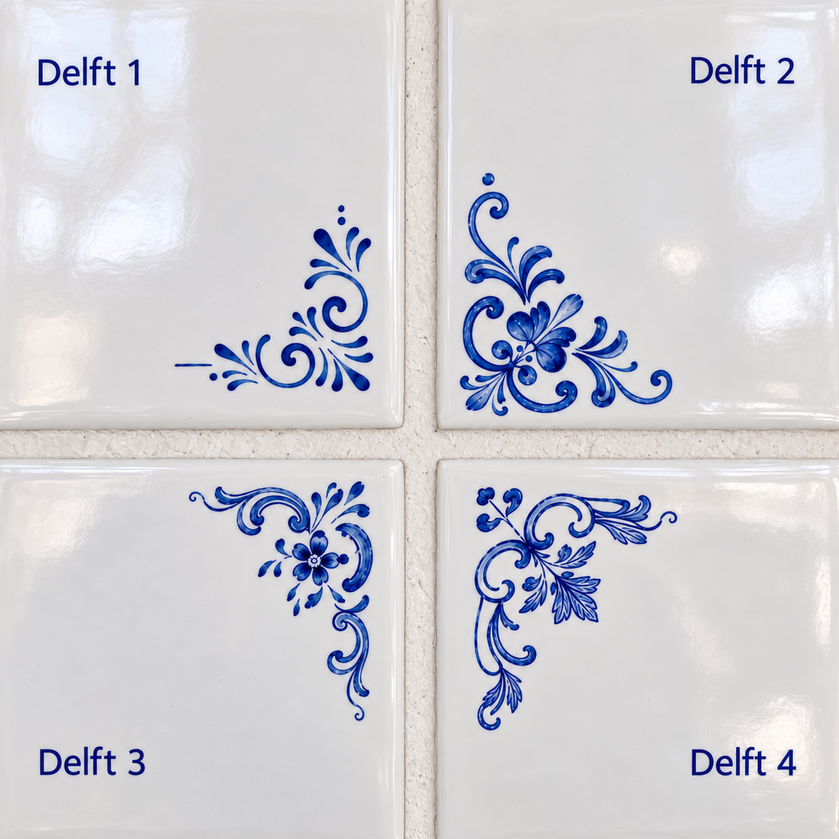 Die vier blauen Delfter Eckrahmen im Vergleich: Delft 1, Delft 2, Delft 3 und Delft 4 auf weißen Keramikfliesen.
